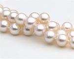 Triple strand pearl necklace at SelecTraders